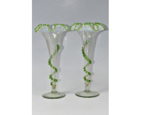 A PAIR OF NINETEENTH CENTURY GLASS VASES, of trumpet form, with green and opalescent frilled rims, and applied green details,