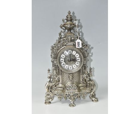 A MODERN ITALIAN MANTEL CLOCK, battery operated, metal case, marked made in Italy, height 41cm x width 24cm x depth 12cm (1) 