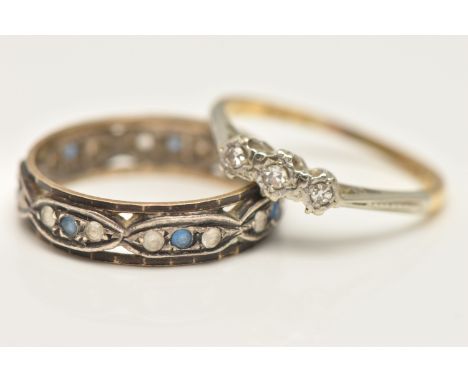 TWO RINGS, the first a yellow and white metal three stone diamond ring, set with three illusion set single cut diamonds, in a