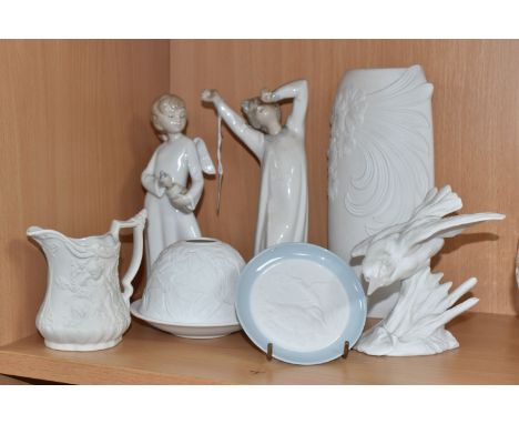 A COLLECTION OF ORNAMENTS to include a Lladro 'Boy Awakening' No. 4870 sculpted by Fulgencia Garcia and issued between 1974 a