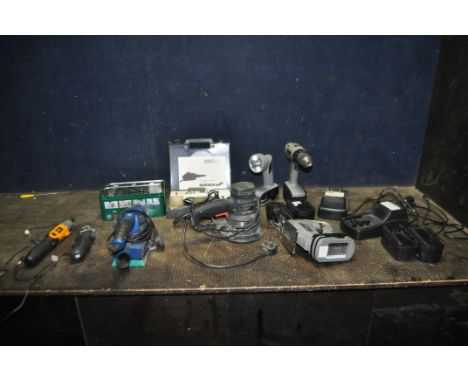 A COLLECTION OF POWER TOOLS, including  Wickes Professional drill, jigsaw and light, five  working batteries, two chargers, t