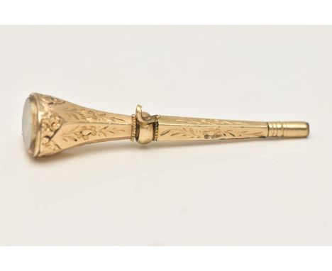 A GOLD PLATED FOB WATCH KEY, fitted with an oval cut Citrine terminal and a broken jump ring for suspension, unmarked, length