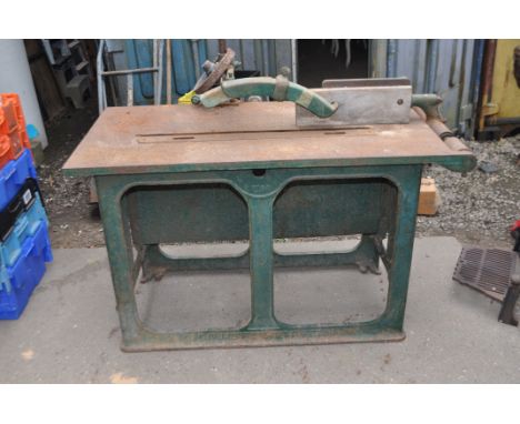A BAMFORDS NO.2 CAST IRON SAW TABLE, with large motor (not fitted and UNTESTED) width 126cm, depth 85cm (VERY HEAVY)