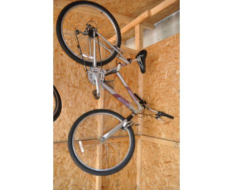 A RALEIGH MANTIS LADIES BIKE with 18 speed Shimano twist grip gears, 19in frame