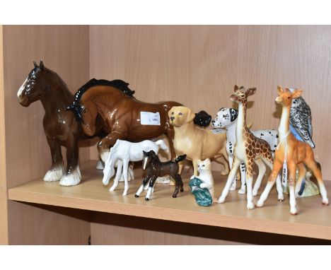 A GROUP OF BESWICK AND ROYAL DOULTON FIGURES, comprising Beswick: two x Small Giraffe no 853 in different colourways, a Budgi