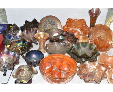 A COLLECTION OF MARIGOLD, BLUE AND GREEN CARNIVAL GLASS to include a number of early twentieth century items, comprising ruff