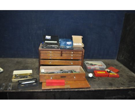 A UNION ENGINEERS TOOLBOX CONTAINING TOOLS, with a wooden construction, one key, three long below four short drawers containi