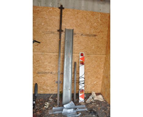 AN INCOMPLETE MOTORCYCLE TRAILER PROJECT with a steel centre bar, galvanised tray, two rocking wheel holders, front bar, hitc