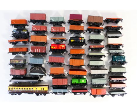 Bachmann - Dapol - Mainline - Trix - A collection of OO gauge rolling stock including tank wagons, open wagons, vans and more