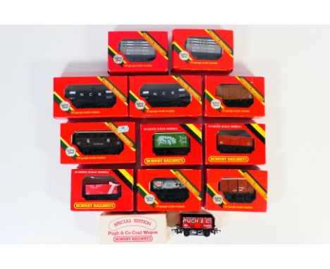 Hornby - A rake of 12 boxed OO gauge Hornby wagons and vans. Lot includes Hornby R106 Sheep S.R Sheep Wagon 51915; R010 7-Pla