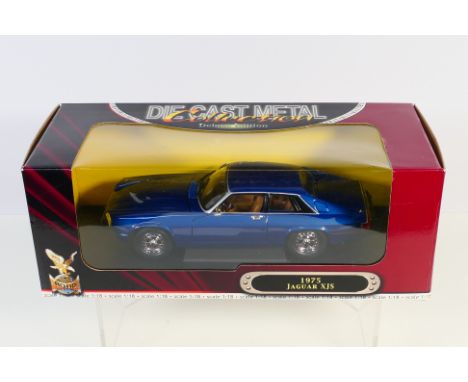 Road Signature - A boxed 1:18 scale Jaguar XJS # 92658. The model appears in Very Good condition except the front bumper is m