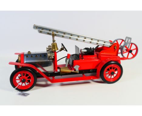 Mamod - An unboxed Mamod Fire Engine. The model has been fired and shows some light signs of use, appearing in Good overall c