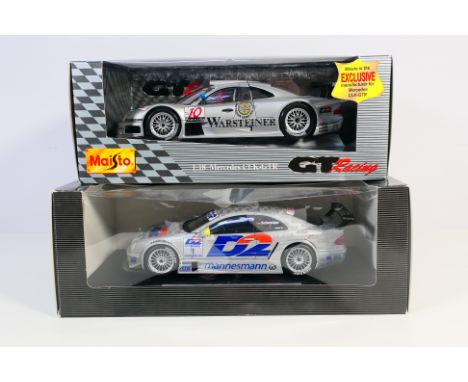 Maisto - Mercedes Dealer - 2 x boxed Mercedes Benz racing models in 1:18 scale, a D2 AMG CLK and a CLK-GTR. They appear Mint 