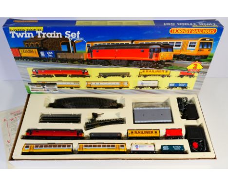 Hornby - A boxed Hornby R545 OO gauge 'Twin Train Set'. The set comes with Class 142 Pacer Twin Railbus; Class 47 Co-Co Diese