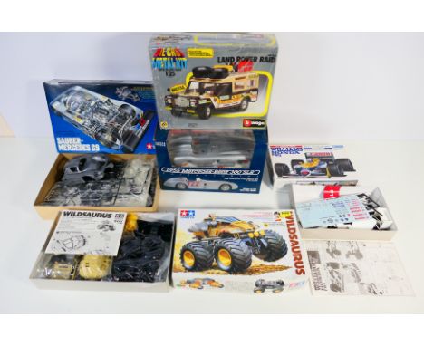 Tamiya - Bburago - Five boxed plastic and diecast model car kits in various scales. Lot includes Tamiya 1:32 scale motorised 