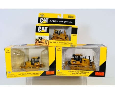 Norscot - 3 x boxed construction vehicle sets, a Cat D7E tracked tractor in 1:50 scale, a Cat D6K XL tracked tractor and a Ca