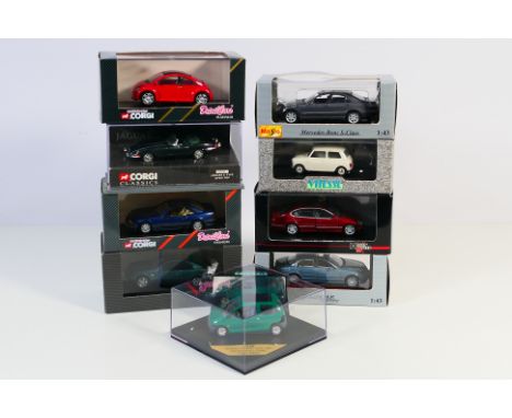 Maisto - Vitesse - Corgi - A group of boxed cars in 1:43 scale including Mercedes 320 SL, Lexus GS300, Morris Mini Minor, Jag