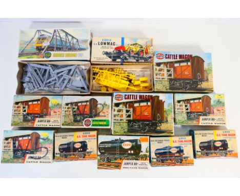 Airfix - 12 boxed OO gauge plastic model railway kits. Lot includes Airfix #02607 Girder Bridge; R204 Lowmac with JCB Excavat
