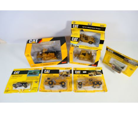 Norscot - A collection of boxed / carded construction models including Cat D10T tracked tractor, Cat D8R Series II tracked tr