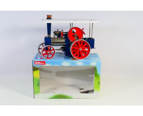 Wilesco - A boxed Wilesco Steam Tractor # D405. The model has been fired and shows signs of use. It appears in Good condition