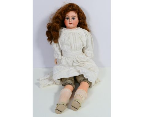 Armand Marseille - An unboxed Armand Marseille 3200 bisque head and shoulder doll. The doll with soft body, bisque hands and 