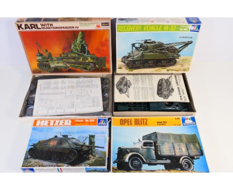 Italeri - Hasegawa - Four vintage boxed plastic military model kits. Lot consists of 1:35 scale Italeri #203 M32 Recovery Veh