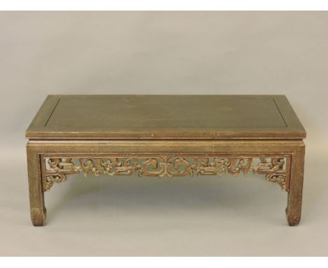 A low Chinese hardwood table, 122 x 61cm