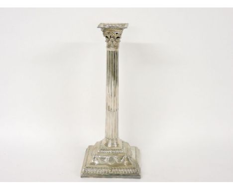 A George III silver Corinthian column candlestick, London 1764, 32cm high, drilled