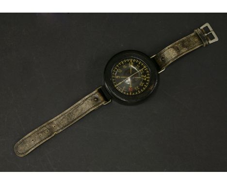 An Armbandkompass Kadlec AK39 Fl.23235 No.952, the brown bakelite case with leather strap, owned by Mr George Pemberton, who 
