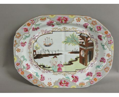 A 19th century Spode meat plate, pattern no 3067, decorated with a 'Chinese' scene of figures, buildings and a ship, 52 x 39c