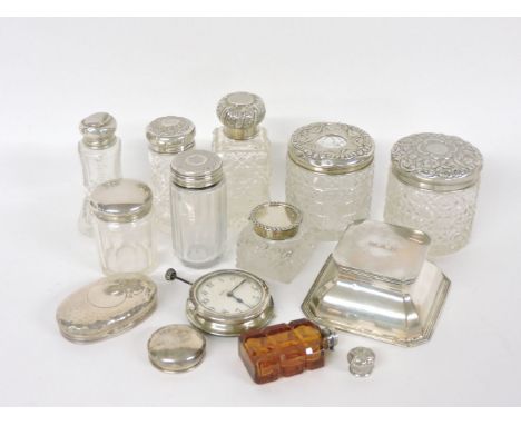 Seven glass dressing table bottles, an inkwell inscribed 'WAH', an ink bottle, a watch, a scent bottle, and two lids