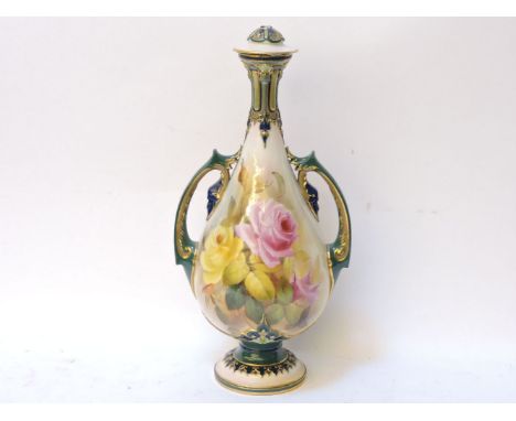 A Royal Worcester bottle vase, of ovoid form, with pierced handles to either side and decorated with hand painted roses, unsi