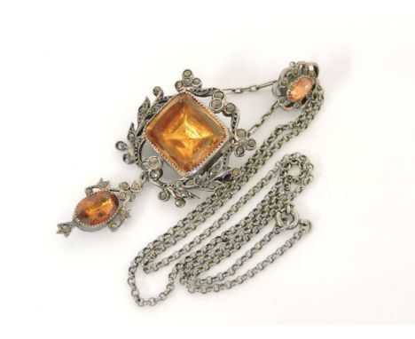 A French silver foiled back quartz and marcasite brooch/pendant, circa 1905, on chain