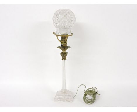 An Edwardian table lamp, with cut glass and gilt bronze Corinthian column and globe shade, 45cm high