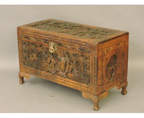 A carved Eastern trunk