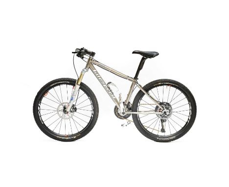 Litespeed Pisgah, a titanium framed medium sized mountain bike with front shock absorbers and Shimano XT gears, with Shimano 