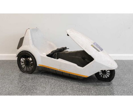 A 1980's Sinclair C5 Three-Wheeled Vehicle, with battery pack and small amount of spares