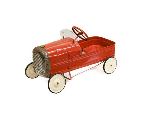 A Triang Metal Bodied and Red Painted Pedal Car, in the form of a 1920's/30's car, with metal grille, chromed horn and four-s