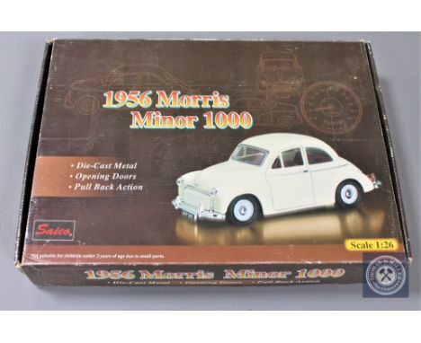 Saico 1:26 scale Morris Minors - A box of twelve car models and three individual commercial vans.