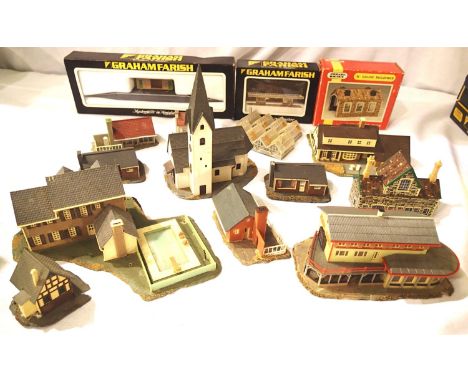 Sixteen N Gauge buildings (three boxed), houses, church, engine shed, station building etc. Ex layout, some damage/missing pa