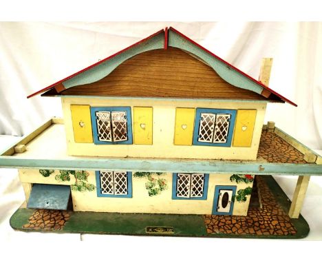 Gee Bee Toys, Hull, dolls house circa 1960s, wood with tinplate opening windows/doors, in good condition , missing back panel