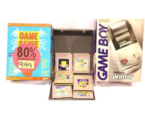 Six assorted Game Boy games, printer and Game Genie, all cartridges present. P&amp;P Group 1 (£14+VAT for the first lot and £