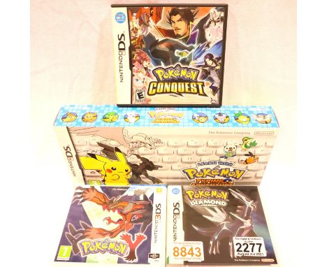 Four Nintendo DS Pokemon games including Typing Adventure including Diamond Version, Y and Conquest, all cartridges present. 