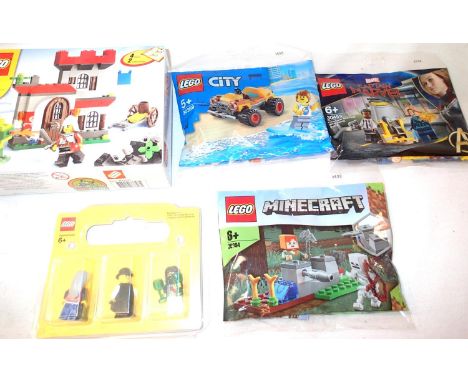 Five Lego sets- 30369, 30394, 30453 and figurine set, all sealed and 5259. P&amp;P Group 1 (£14+VAT for the first lot and £1+