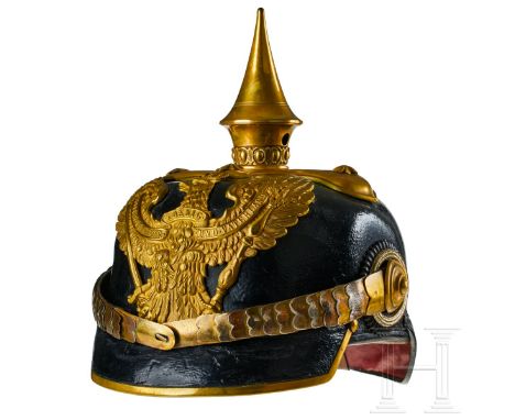 'A helmet for Prussian Line Dragoon Officers Black lacquered leather body; front visor with green underlay, rear visor with r