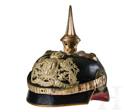 'A helmet for Bavarian Infantry Leib Regiment Officers Black lacquered leather body; front visor with green underlay, rear vi