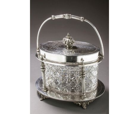 A late Victorian cut glass biscuit box with silver plated mounts, oval with flat-hinged cover and cast foliate finial, the wh