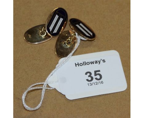 A pair of 9ct gold and enamel cufflinks, the oval plaques with Art Deco style blue and white enamel pattern