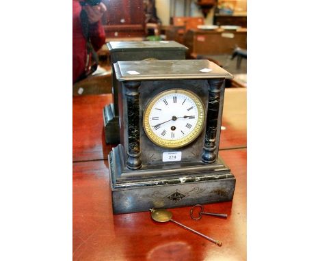 A Victorian black slate mantel clock, with eight-day movement and enamel dial, in a stepped rectangular case