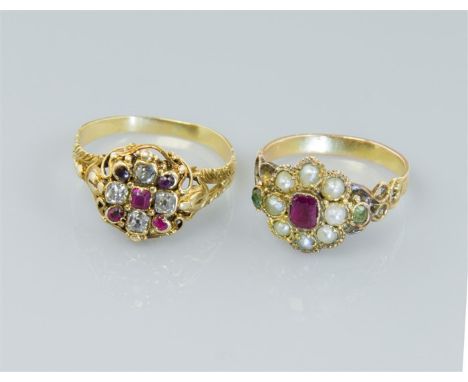 A mid 19th century ruby, peridot and split pearl cluster ring, in a carved pierced mount, together with a mid 19th century ru